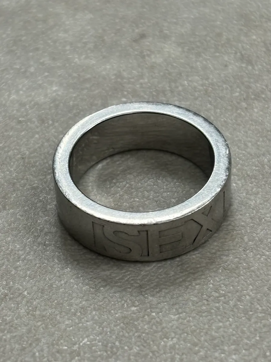 2000s Dolce & Gabbana Sex & Logo Engraved Grey Steel Ring