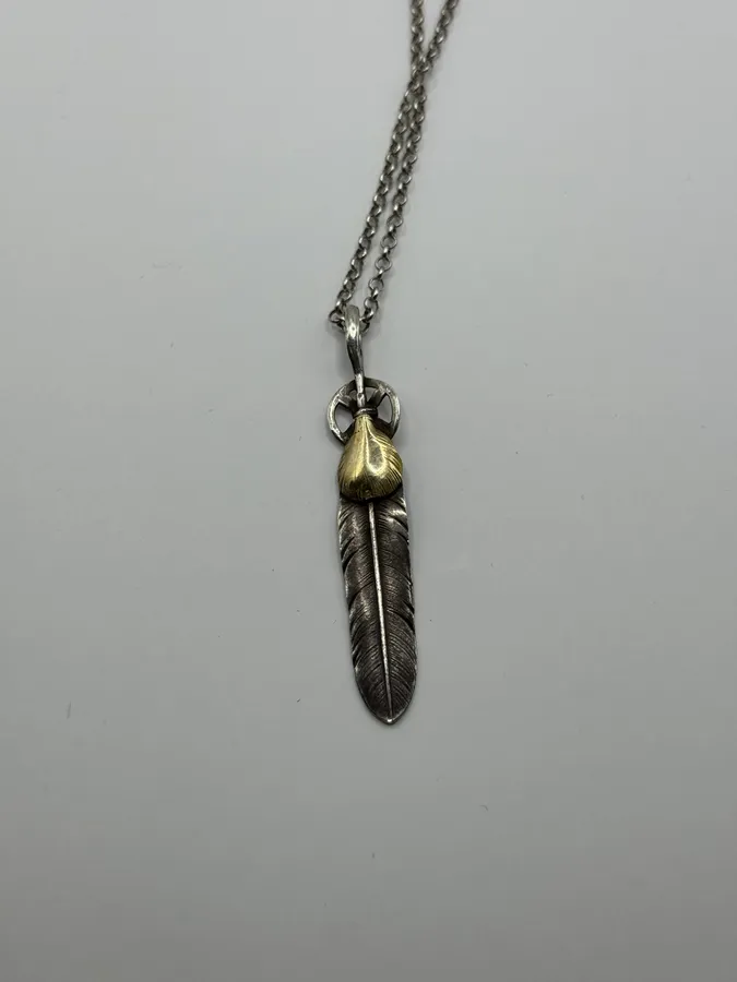 Goro’s Gold Top Heart Wheel Feather Silver Pendant - Image 8